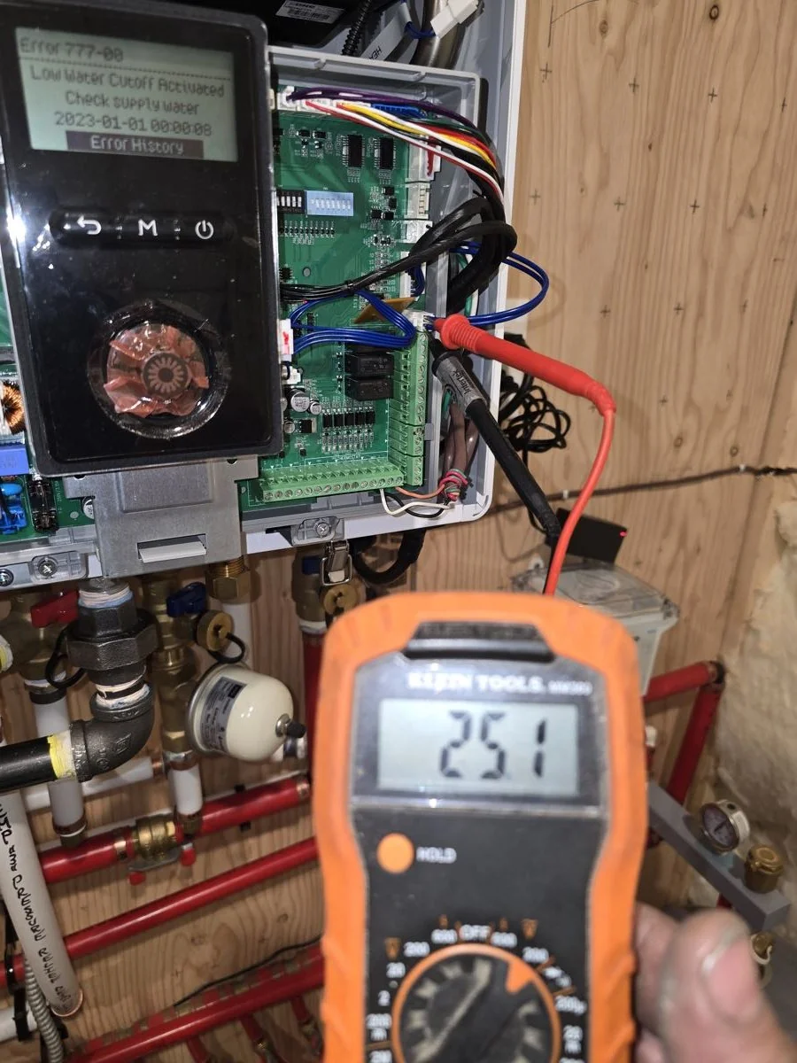 Control board checked with a multimeter during a diagnostic call