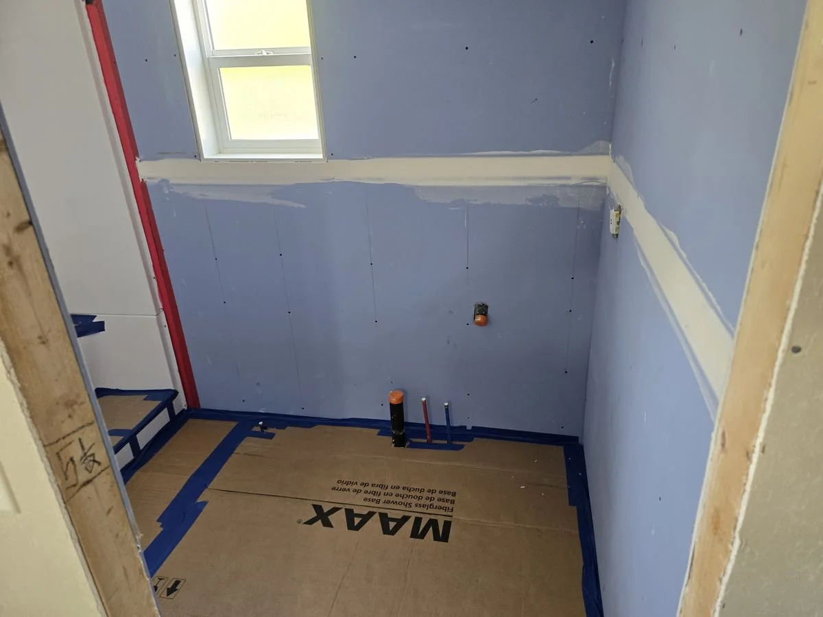 Waterproofing and board complete in a bathroom before tiling